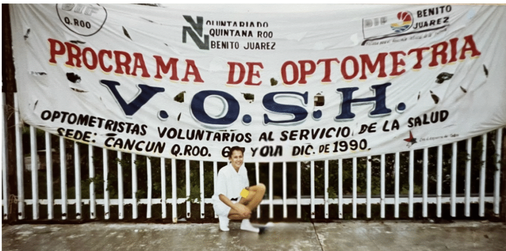 Dr. Yvette Colón in front of a VOSH banner.